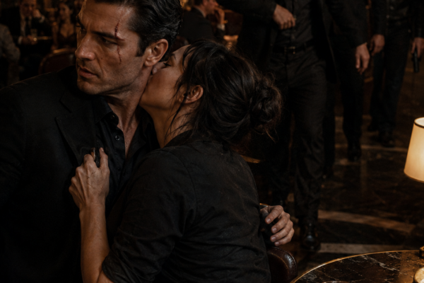 She Kissed a Stranger to Stop an Execution in a Crowded Bar—Then Learned He Was the Mafia Boss Who Had Set the Ambush Himself, and Her Split-Second Rescue Made His Enemies Decide the Exhausted Waitress Must Be the Weakness They Could Use Against Him